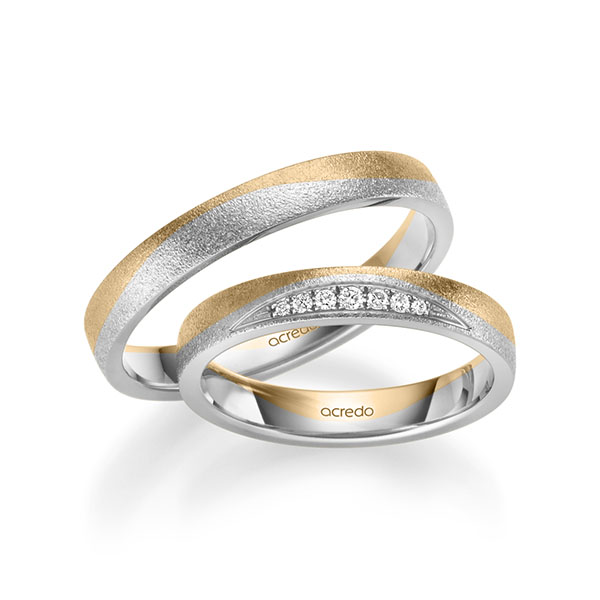 Set Bicolor trouwringen in roségoud 14 kt. witgoud 14 kt. met in totaal 0,061 ct. Briljant tw/si van acredo