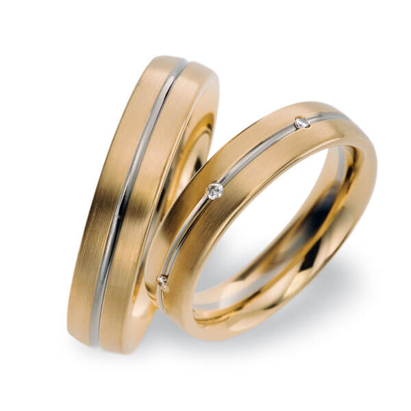 Set Bicolor trouwringen in roségoud 14 kt. witgoud 14 kt. met in totaal 0,07 ct. Briljant tw,vs van acredo