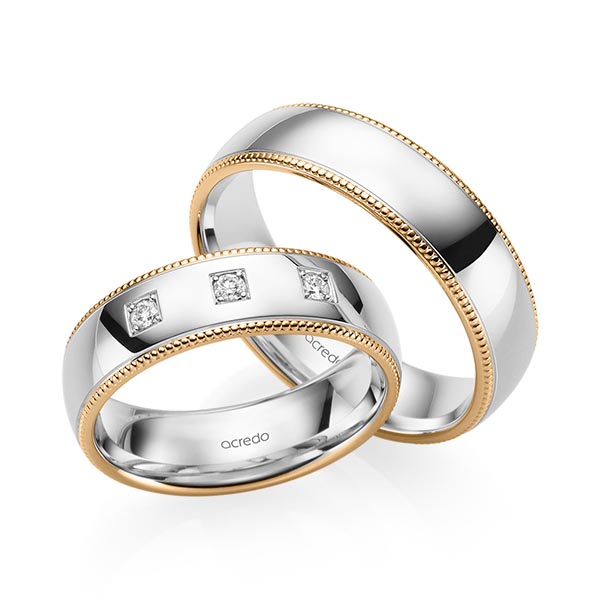 Set Bicolor trouwringen in roségoud 14 kt. witgoud 14 kt. met in totaal 0,09 ct. Briljant tw/si van acredo