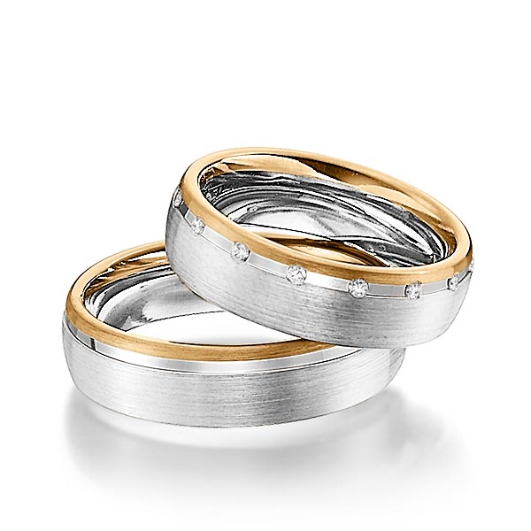 Set Bicolor trouwringen in roségoud 14 kt. witgoud 14 kt. met in totaal 0,15 ct. Briljant tw/si van Steinberg