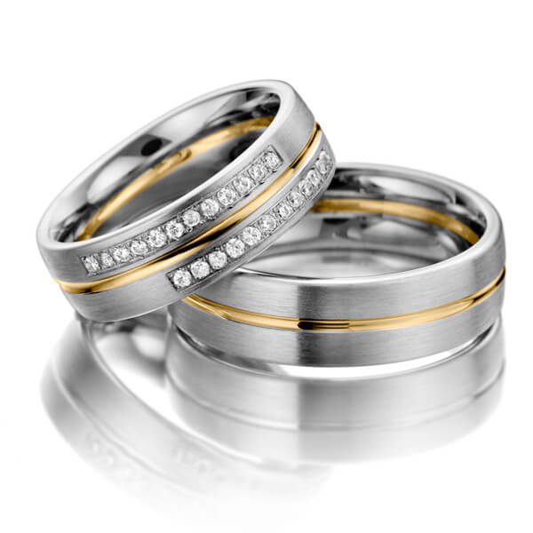 Set Bicolor trouwringen in wit 9 kt. goudhoudend metaal (37,5%) geel 9 kt. goudhoudend metaal (37,5%) met in totaal 0,192 ct. Briljant tw/si - NP-1073-2 Set Bicolor trouwringen in wit 9 kt. goudhoudend metaal (37,5%) geel 9 kt. goudhoudend metaal (37,5%) met in totaal 0,192 ct. Briljant tw/si - NP-1073-2