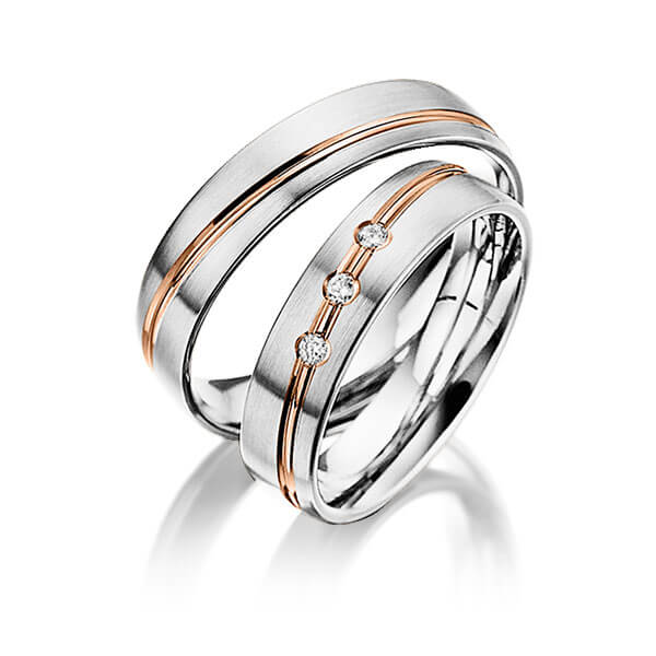 Set Bicolor trouwringen in wit 9 kt. goudhoudend metaal (37,5%) rood 9 kt. goudhoudend metaal (37,5%) met in totaal 0,06 ct. Briljant tw/si van Steinberg - Q-1394-2