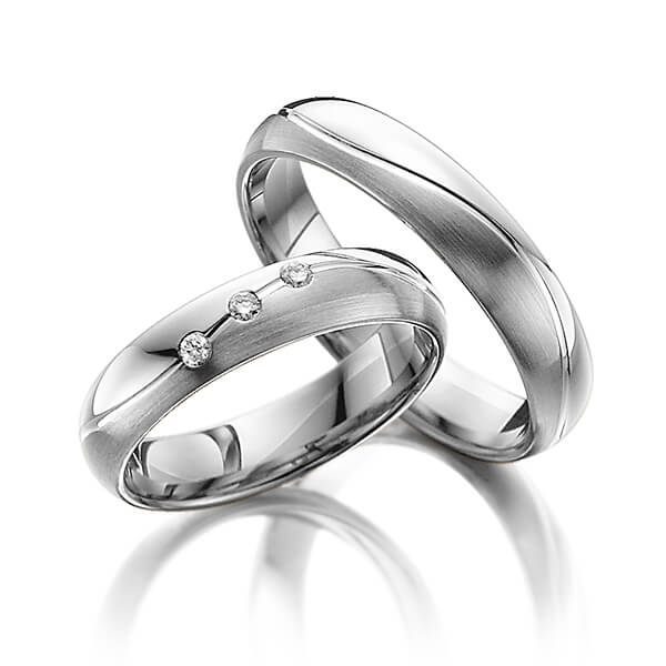 Set Bicolor trouwringen in witgoud 14 kt. dark grey gold 14 kt. met in totaal 0,06 ct. Briljant tw/si van Steinberg