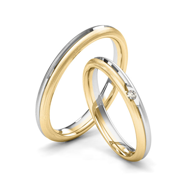 Set Bicolor trouwringen in witgoud 14 kt. geelgoud 14 kt. met in totaal 0,025 ct. Briljant tw/si van Merii