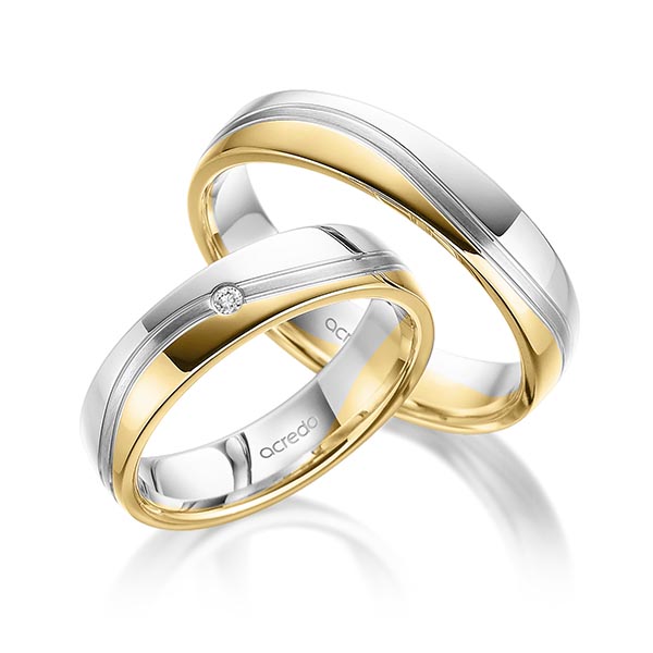 Set Bicolor trouwringen in witgoud 14 kt. geelgoud 14 kt. met in totaal 0,02 ct. Briljant tw/si van acredo