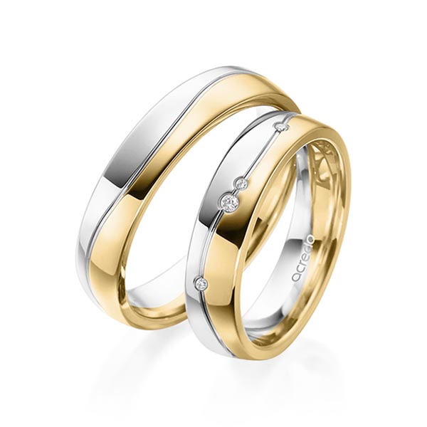 Set Bicolor trouwringen in witgoud 14 kt. geelgoud 14 kt. met in totaal 0,036 ct. Briljant tw/si van acredo
