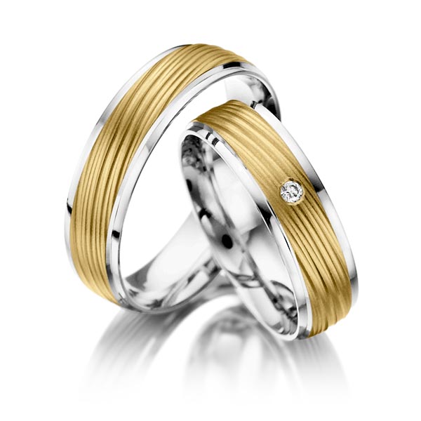 Set Bicolor trouwringen in witgoud 14 kt. geelgoud 14 kt. met in totaal 0,03 ct. Briljant tw/si van Steinberg