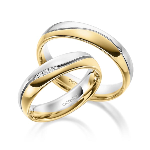 Set Bicolor trouwringen in witgoud 14 kt. geelgoud 14 kt. met in totaal 0,041 ct. Briljant tw/si van acredo