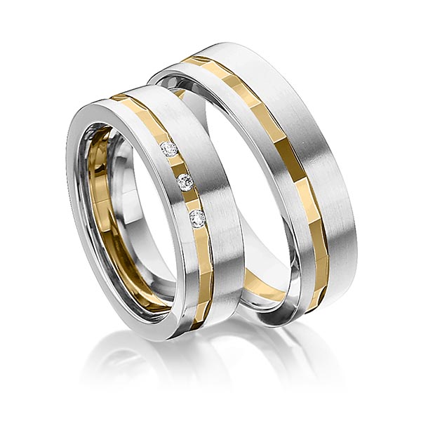 Set Bicolor trouwringen in witgoud 14 kt. geelgoud 14 kt. met in totaal 0,045 ct. Briljant tw/si van Eternal Touch