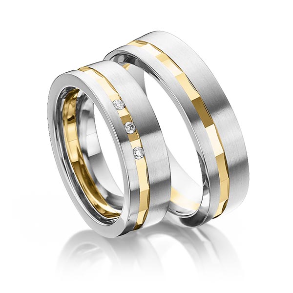 Set Bicolor trouwringen in witgoud 14 kt. geelgoud 14 kt. met in totaal 0,045 ct. Briljant tw/si van Steinberg