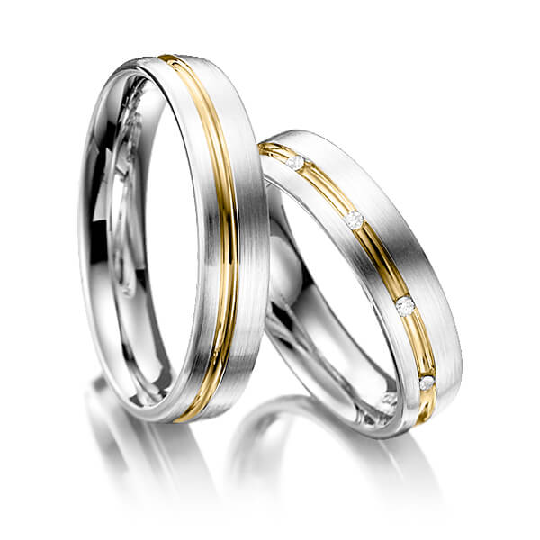 Set Bicolor trouwringen in witgoud 14 kt. geelgoud 14 kt. met in totaal 0,05 ct. Briljant tw/si van Eternal Touch