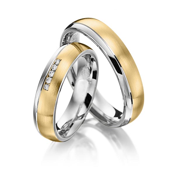 Set Bicolor trouwringen in witgoud 14 kt. geelgoud 14 kt. met in totaal 0,05 ct. Briljant tw/si van Steinberg