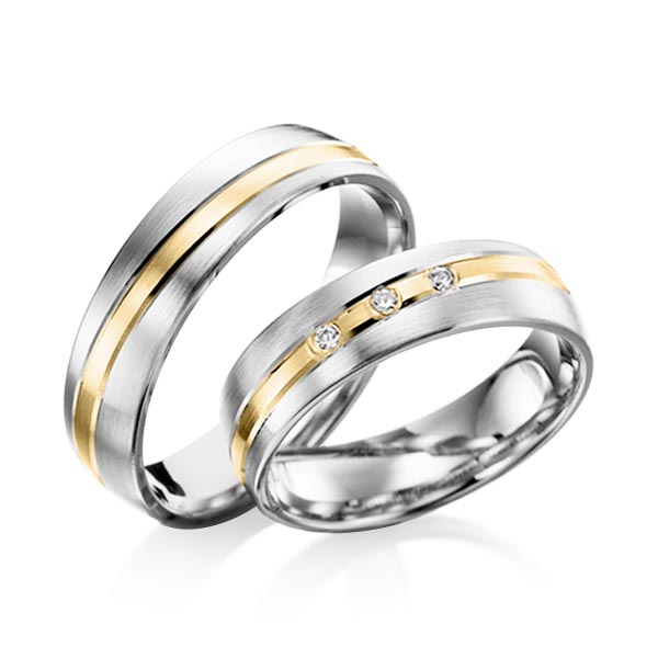 Set Bicolor trouwringen in witgoud 14 kt. geelgoud 14 kt. met in totaal 0,06 ct. Briljant tw/si 