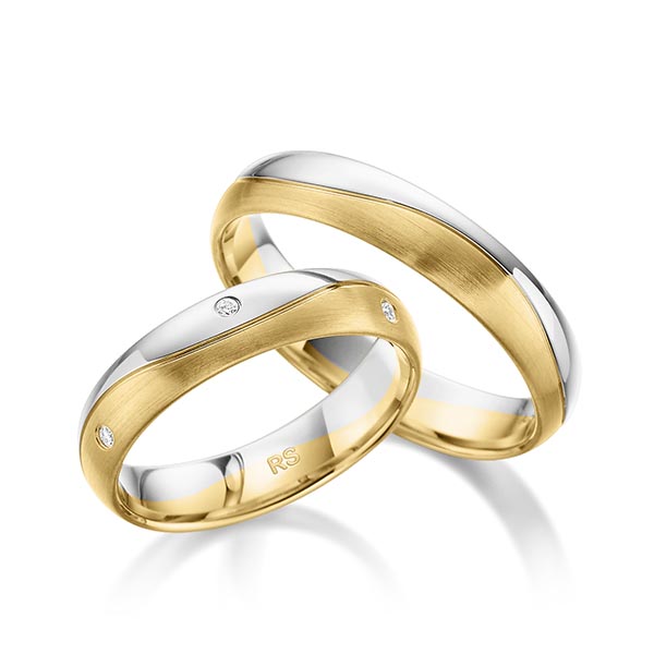 Set Bicolor trouwringen in witgoud 14 kt. geelgoud 14 kt. met in totaal 0,06 ct. Briljant tw/si van acredo