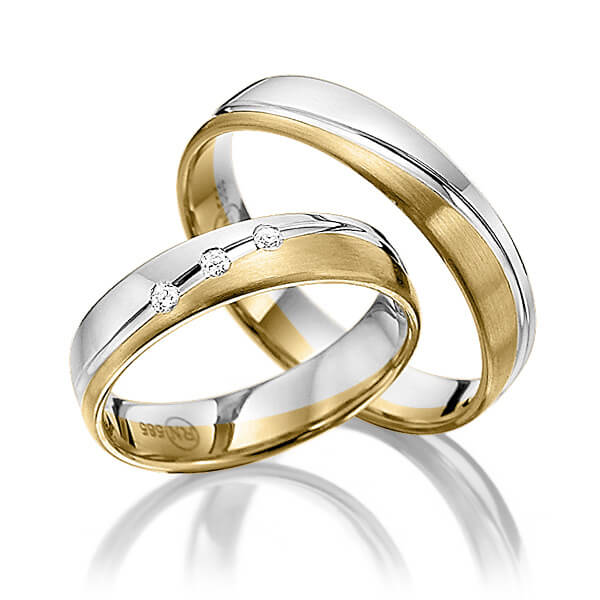 Set Bicolor trouwringen in witgoud 14 kt. geelgoud 14 kt. met in totaal 0,06 ct. Briljant tw/si van Steinberg