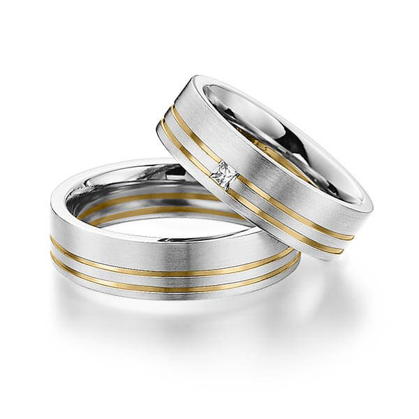 Set Bicolor trouwringen in witgoud 14 kt. geelgoud 14 kt. met in totaal 0,06 ct. Princess-Diamant tw/si van Eternal Touch