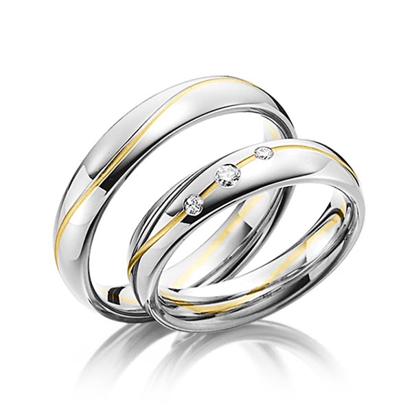 Set Bicolor trouwringen in witgoud 14 kt. geelgoud 14 kt. met in totaal 0,08 ct. Briljant tw/si van Steinberg