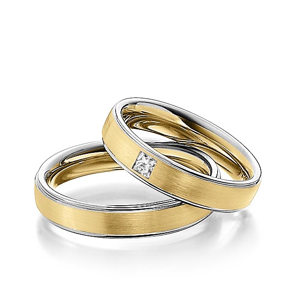 Set Bicolor trouwringen in witgoud 14 kt. geelgoud 14 kt. met in totaal 0,08 ct. Princess-Diamant tw/si van Steinberg