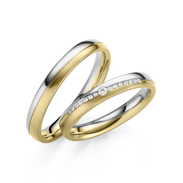 Set Bicolor trouwringen in witgoud 14 kt. geelgoud 14 kt. met in totaal 0,095 ct. Briljant tw,vs van Eternal Touch