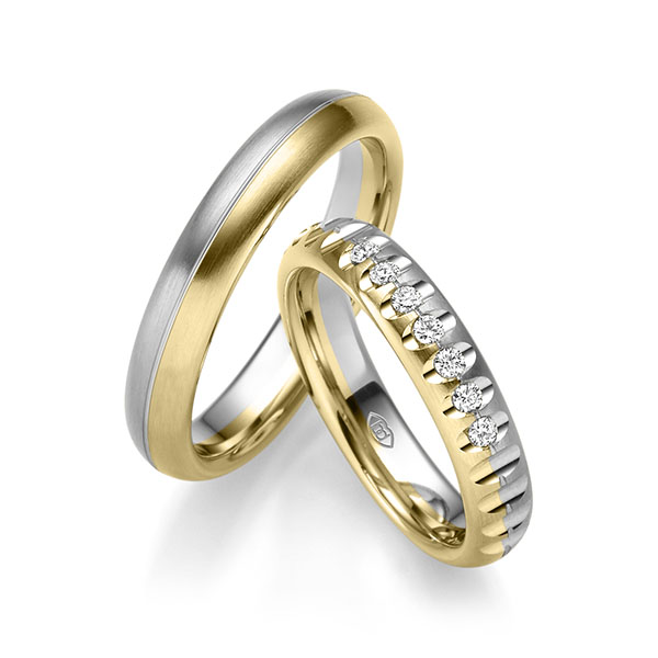 Set Bicolor trouwringen in witgoud 14 kt. geelgoud 14 kt. met in totaal 0,14 ct. Briljant tw/si van Merii