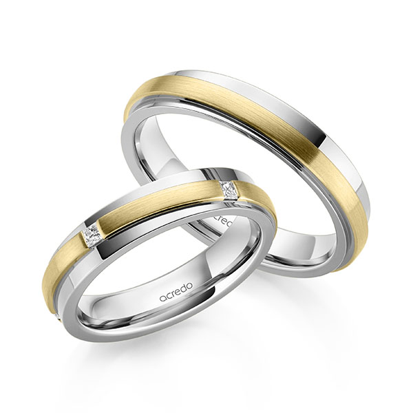 Set Bicolor trouwringen in witgoud 14 kt. geelgoud 14 kt. met in totaal 0,15 ct. Princess-Diamant tw/si van acredo