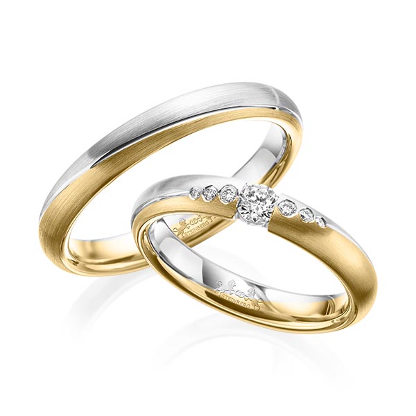 Set Bicolor trouwringen in witgoud 14 kt. geelgoud 14 kt. met in totaal 0,18 ct. Briljant tw/si van Steinberg