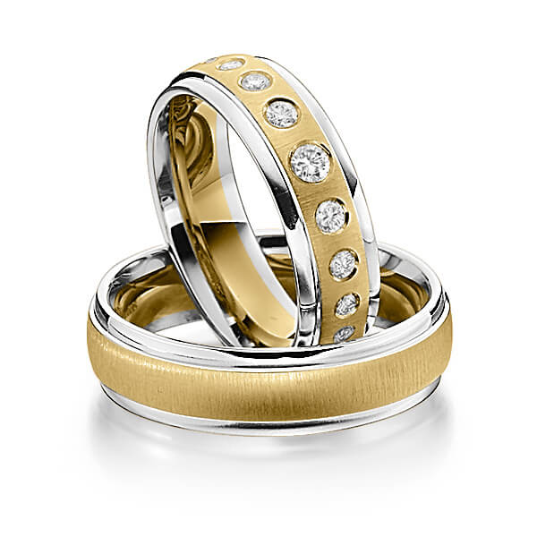 Set Bicolor trouwringen in witgoud 14 kt. geelgoud 14 kt. met in totaal 0,19 ct. Briljant tw/si van Steinberg