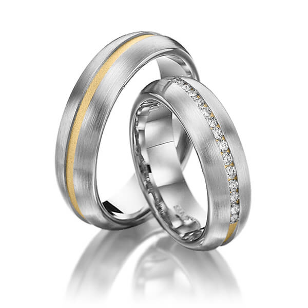 Set Bicolor trouwringen in witgoud 14 kt. geelgoud 14 kt. met in totaal 0,225 ct. Briljant tw/si van Steinberg