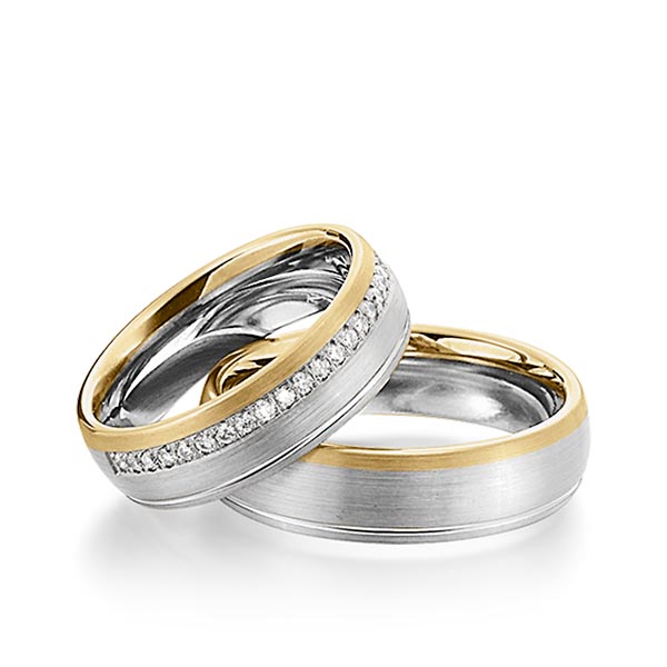 Set Bicolor trouwringen in witgoud 14 kt. geelgoud 14 kt. met in totaal 0,23 ct. Briljant tw/si van Steinberg