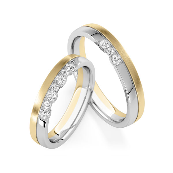 Set Bicolor trouwringen in witgoud 14 kt. geelgoud 14 kt. met in totaal 0,28 ct. tw,vs tw/si van Steinberg