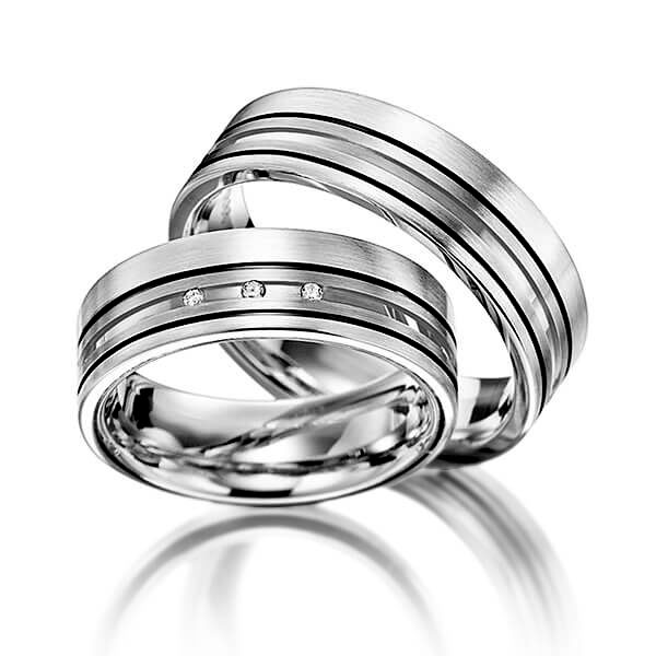 Set Bicolor trouwringen in witgoud 14 kt. grijsgoud 14 kt. met in totaal 0,03 ct. Briljant tw/si van Merii