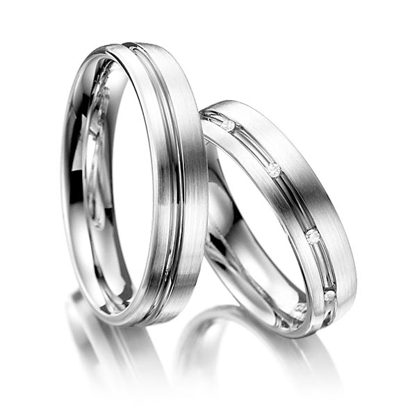 Set Bicolor trouwringen in witgoud 14 kt. grijsgoud 14 kt. met in totaal 0,05 ct. Briljant tw/si van Steinberg - Q-1198-8 Set Bicolor trouwringen in witgoud 14 kt. grijsgoud 14 kt. met in totaal 0,05 ct. Briljant tw/si van Steinberg - Q-1198-8