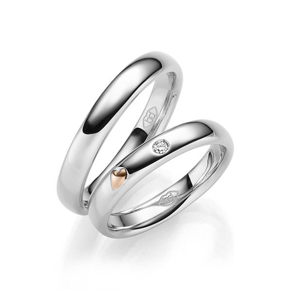 Set Bicolor trouwringen in witgoud 14 kt. roodgoud 14 kt. met in totaal 0,03 ct. Briljant tw/si 