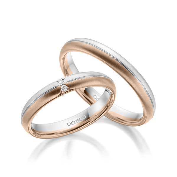 Set Bicolor trouwringen in witgoud 14 kt. roodgoud 14 kt. met in totaal 0,03 ct. Briljant tw/si van acredo