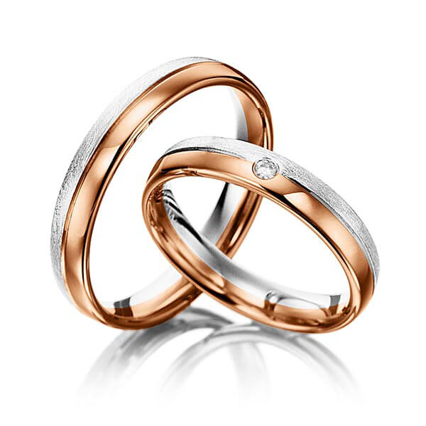 Set Bicolor trouwringen in witgoud 14 kt. roodgoud 14 kt. met in totaal 0,03 ct. Briljant tw/si van acredo - S-1063-10 Set Bicolor trouwringen in witgoud 14 kt. roodgoud 14 kt. met in totaal 0,03 ct. Briljant tw/si van acredo - S-1063-10