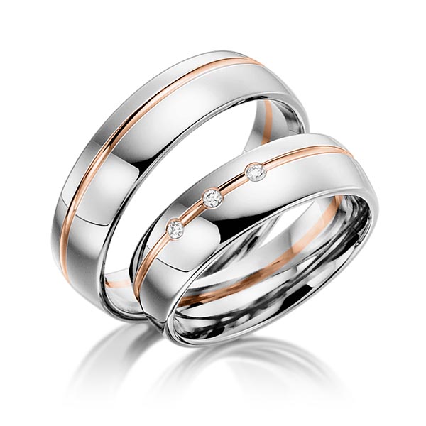 Set Bicolor trouwringen in witgoud 14 kt. roodgoud 14 kt. met in totaal 0,045 ct. Briljant tw,vs van acredo
