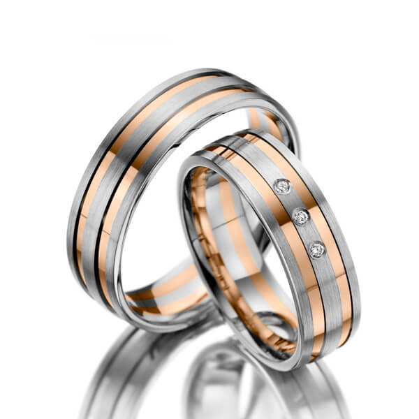 Set Bicolor trouwringen in witgoud 14 kt. roodgoud 14 kt. met in totaal 0,045 ct. Briljant tw/si 