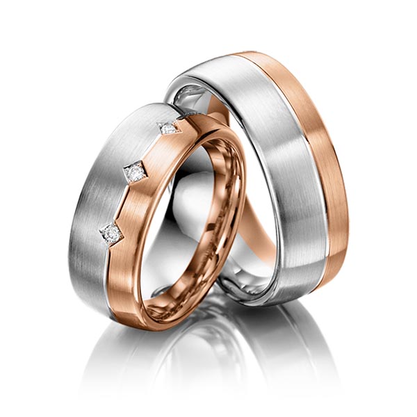 Set Bicolor trouwringen in witgoud 14 kt. roodgoud 14 kt. met in totaal 0,06 ct. Briljant tw,vs van acredo
