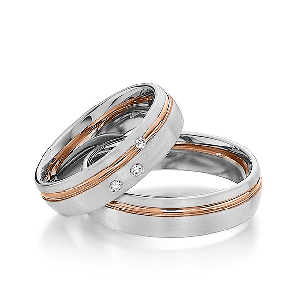 Set Bicolor trouwringen in witgoud 14 kt. roodgoud 14 kt. met in totaal 0,06 ct. Briljant tw/si van Steinberg