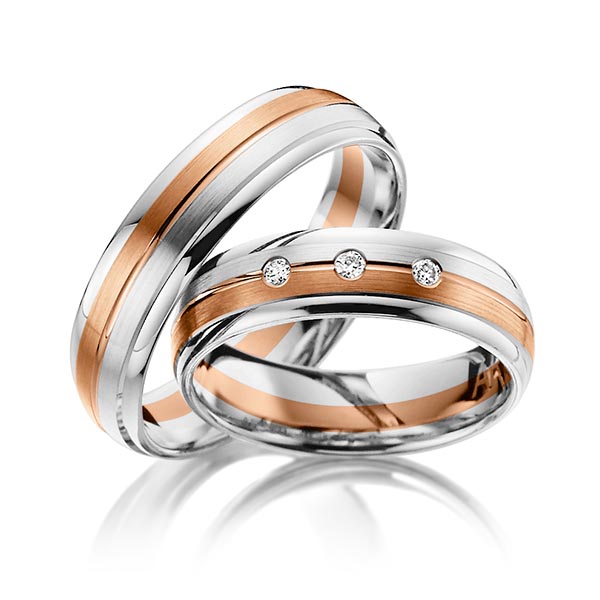 Set Bicolor trouwringen in witgoud 14 kt. roodgoud 14 kt. met in totaal 0,06 ct. Briljant tw/si van Steinberg