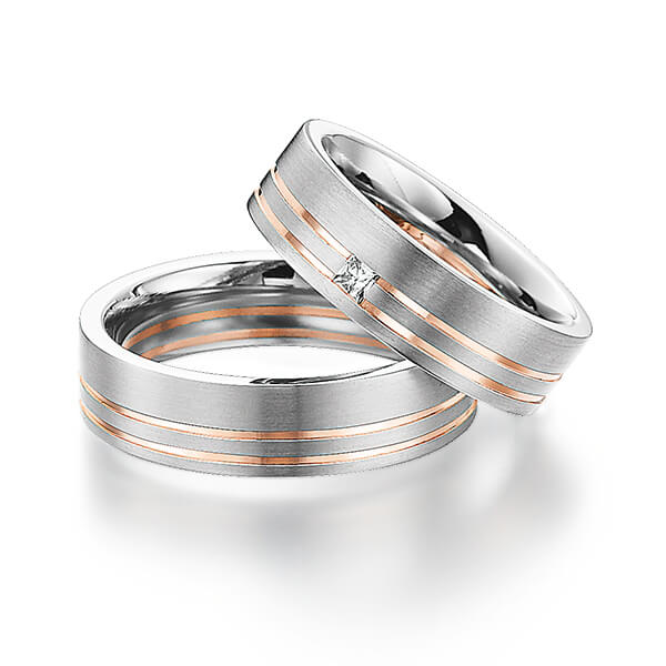 Set Bicolor trouwringen in witgoud 14 kt. roodgoud 14 kt. met in totaal 0,06 ct. Princess-Diamant tw/si van Steinberg