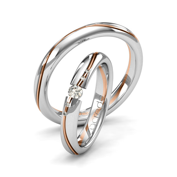 Set Bicolor trouwringen in witgoud 14 kt. roodgoud 14 kt. met in totaal 0,07 ct. Briljant tw/si van acredo