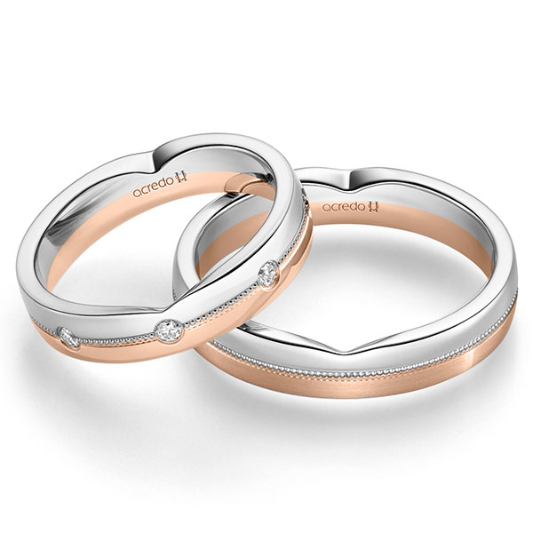 Set Bicolor trouwringen in witgoud 14 kt. roodgoud 14 kt. met in totaal 0,24 ct. Briljant tw/si van acredo