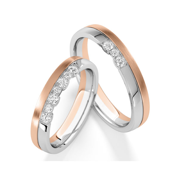 Set Bicolor trouwringen in witgoud 14 kt. roodgoud 14 kt. met in totaal 0,28 ct. tw,vs tw/si van Steinberg