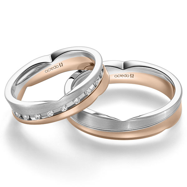 Set Bicolor trouwringen in witgoud 14 kt. roodgoud 14 kt. met in totaal 0,315 ct. Briljant tw/si van acredo
