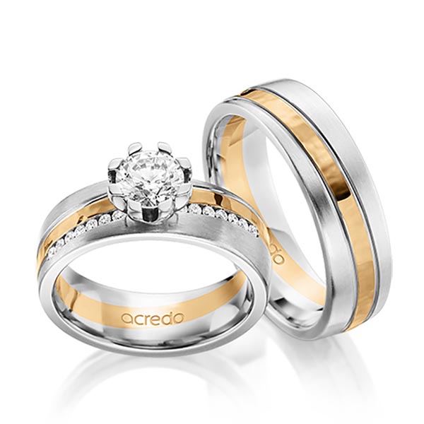 Set Bicolor trouwringen in witgoud 14 kt. roségoud 14 kt. , hamerslag met 0,7 ct. + in totaal 0,14 ct. Briljant tw,vs van acredo