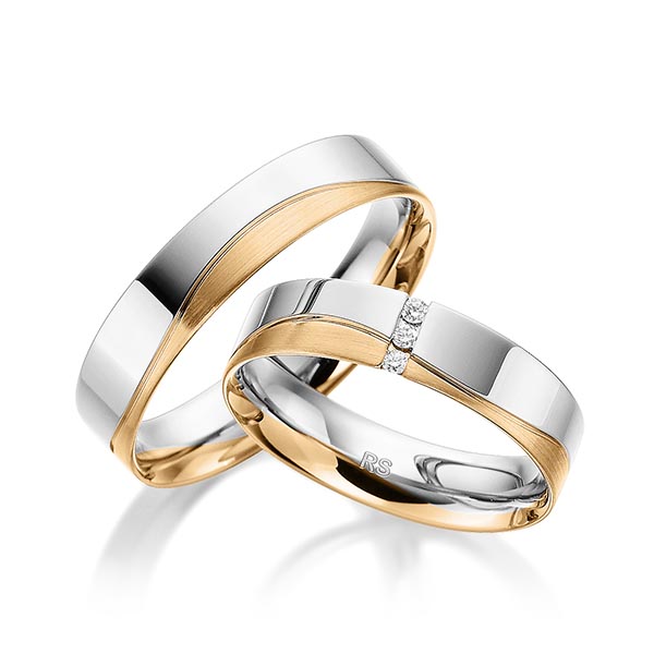 Set Bicolor trouwringen in witgoud 14 kt. roségoud 14 kt. met in totaal 0,045 ct. Briljant tw/si van acredo