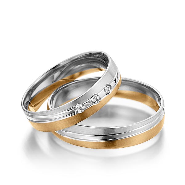Set Bicolor trouwringen in witgoud 14 kt. roségoud 14 kt. met in totaal 0,06 ct. Briljant tw/si van Steinberg