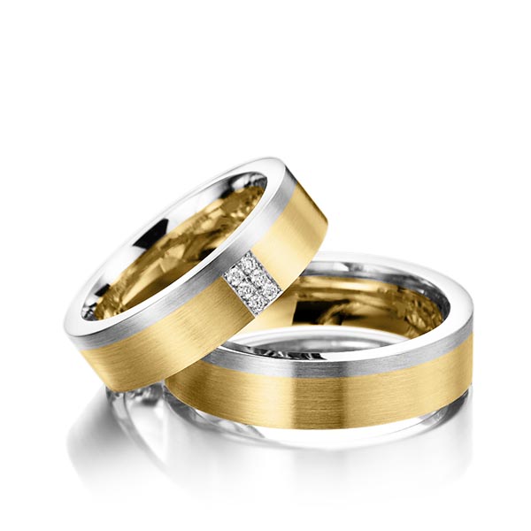 Set Bicolor trouwringen in witgoud 14 kt. roségoud 14 kt. met in totaal 0,06 ct. Briljant tw/si van Steinberg