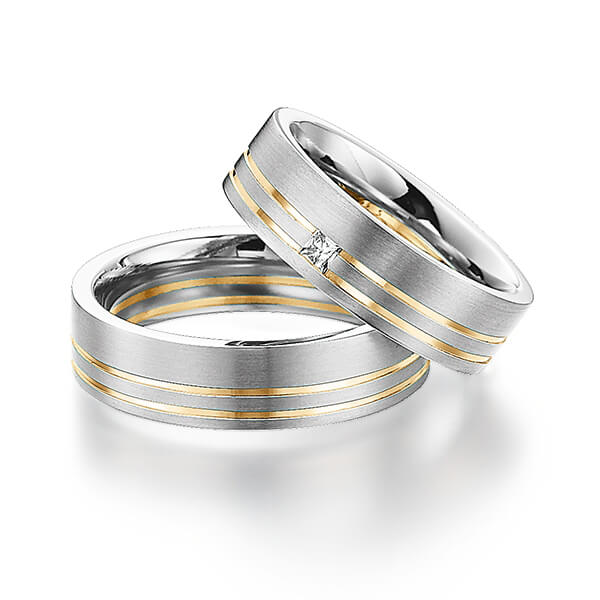 Set Bicolor trouwringen in witgoud 14 kt. roségoud 14 kt. met in totaal 0,06 ct. Princess-Diamant tw/si van Steinberg